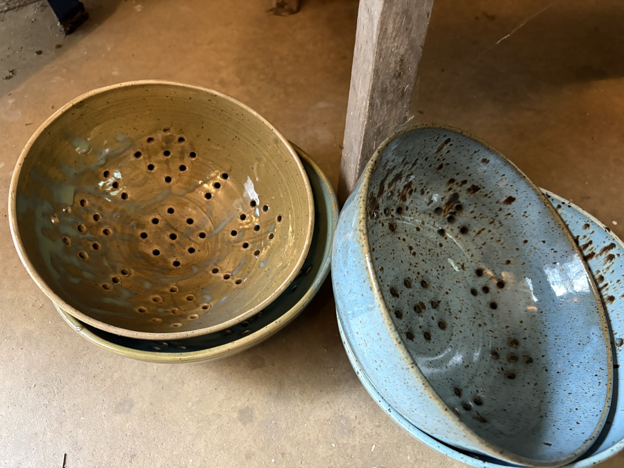 Handmade berry bowls in soft blue and green glazes