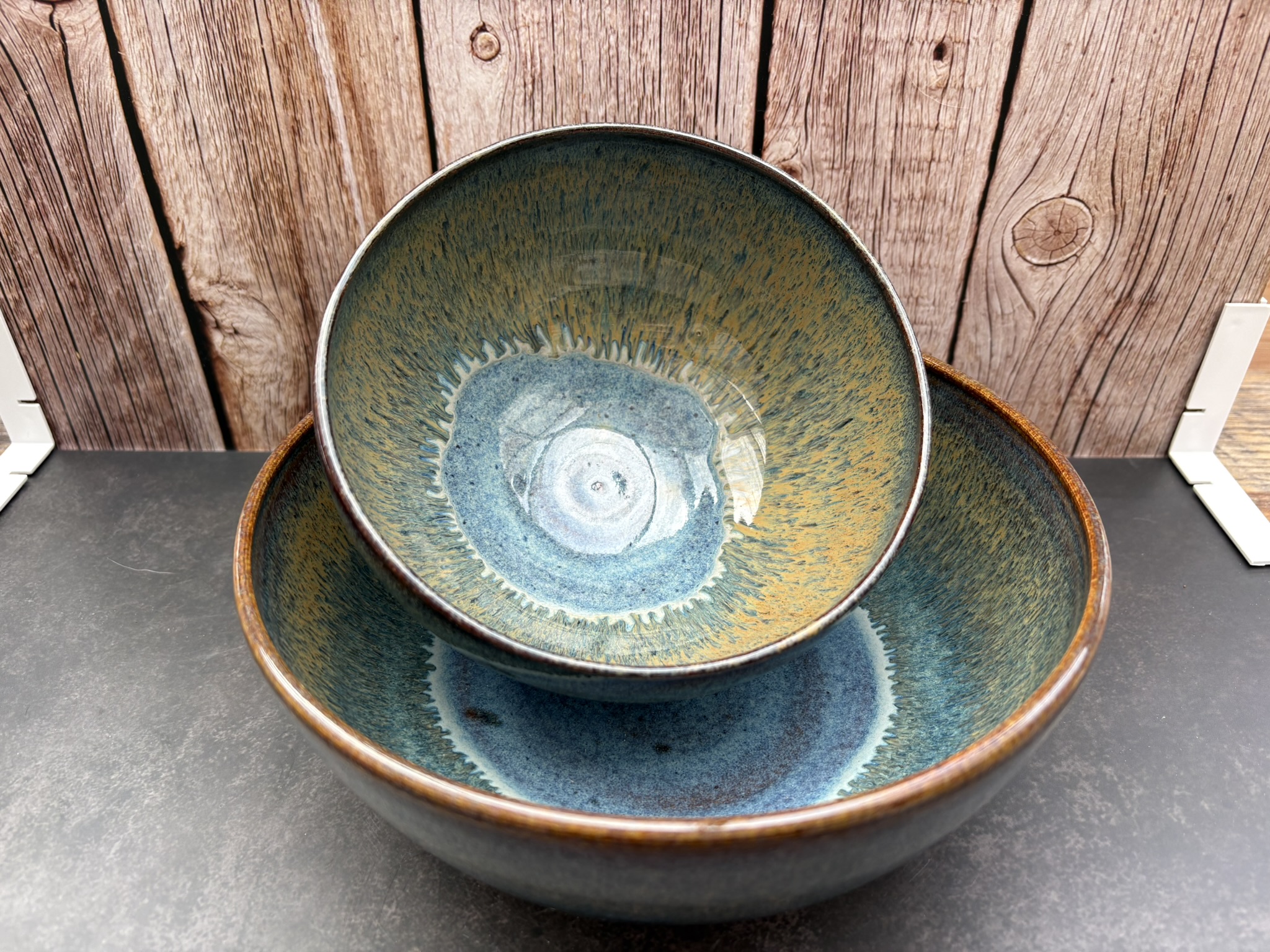 Handmade bowls with layered blue-green glaze